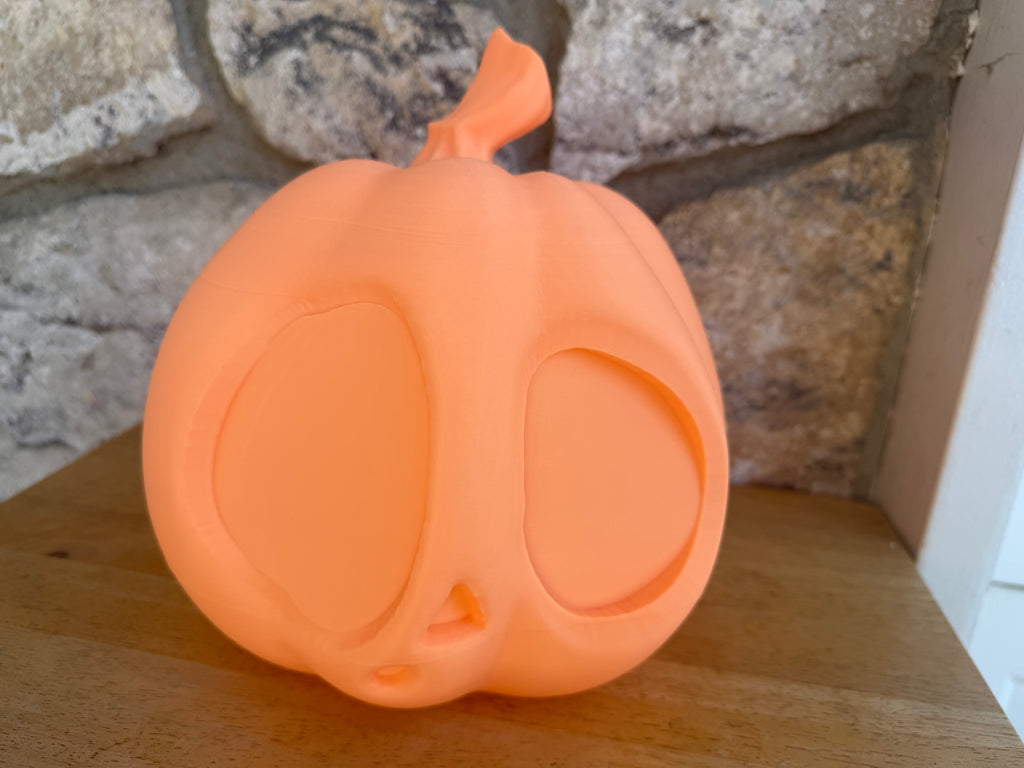 Spooked Pumpkin 10 inches wide x 10 inches long x 10 inches tall